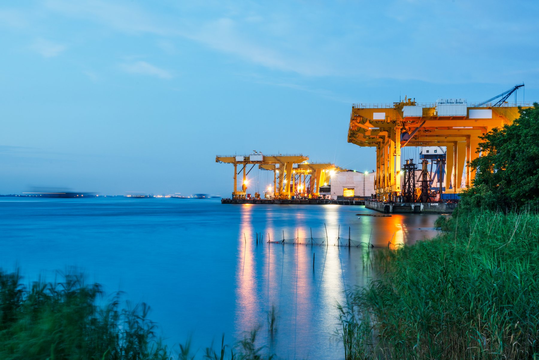 View of port and commercial area at sunset